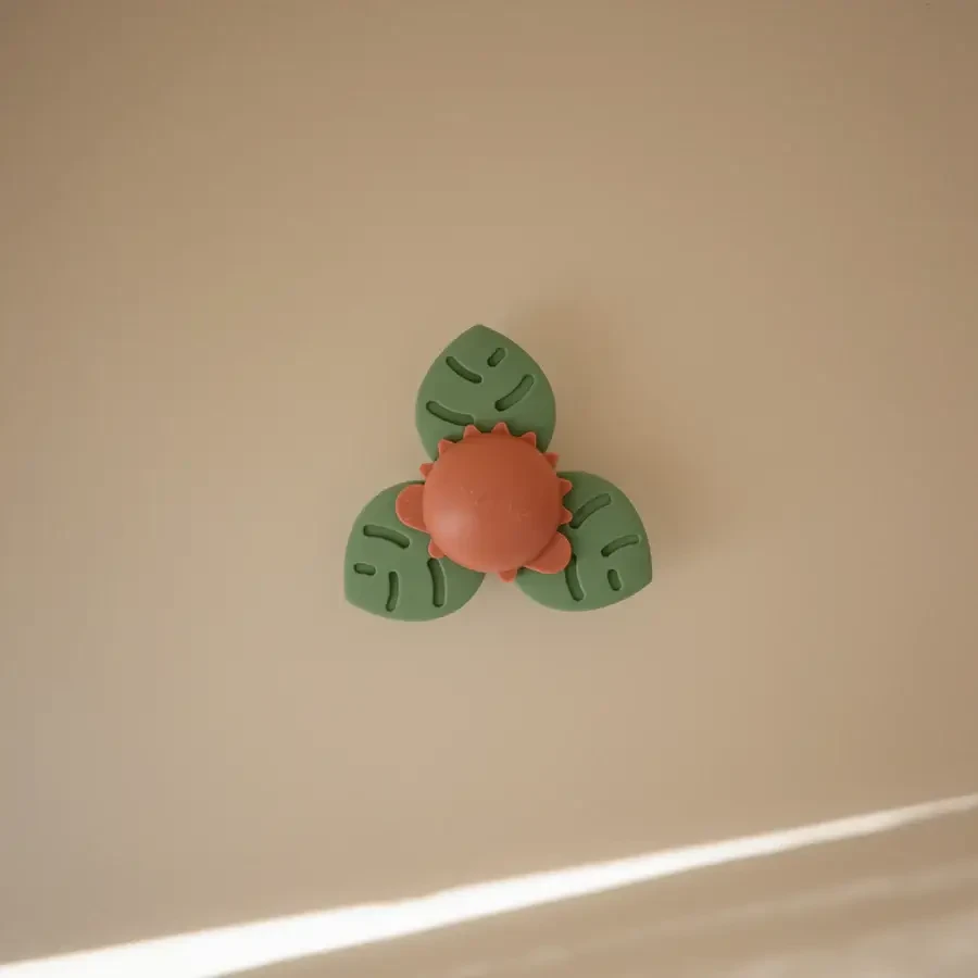 Spinner sensoryczny z przyssawką - Dino / Mushie