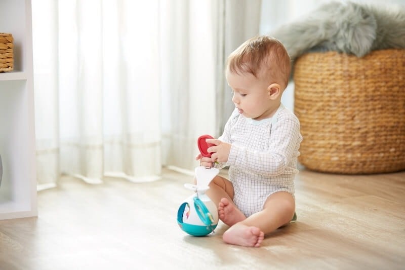 Interaktywna karuzela, czas dla brzuszka - Zabawa na łące / Tiny Love