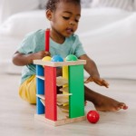 Drewniana wieża przebijanka z kolorowymi kulkami i młotkiem / Melissa & Doug