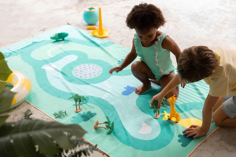 Dwustronny ręcznik plażowy PlayTowels - Safari / QUUT