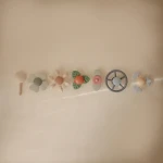 Spinner sensoryczny z przyssawką - Water Wheel / Mushie