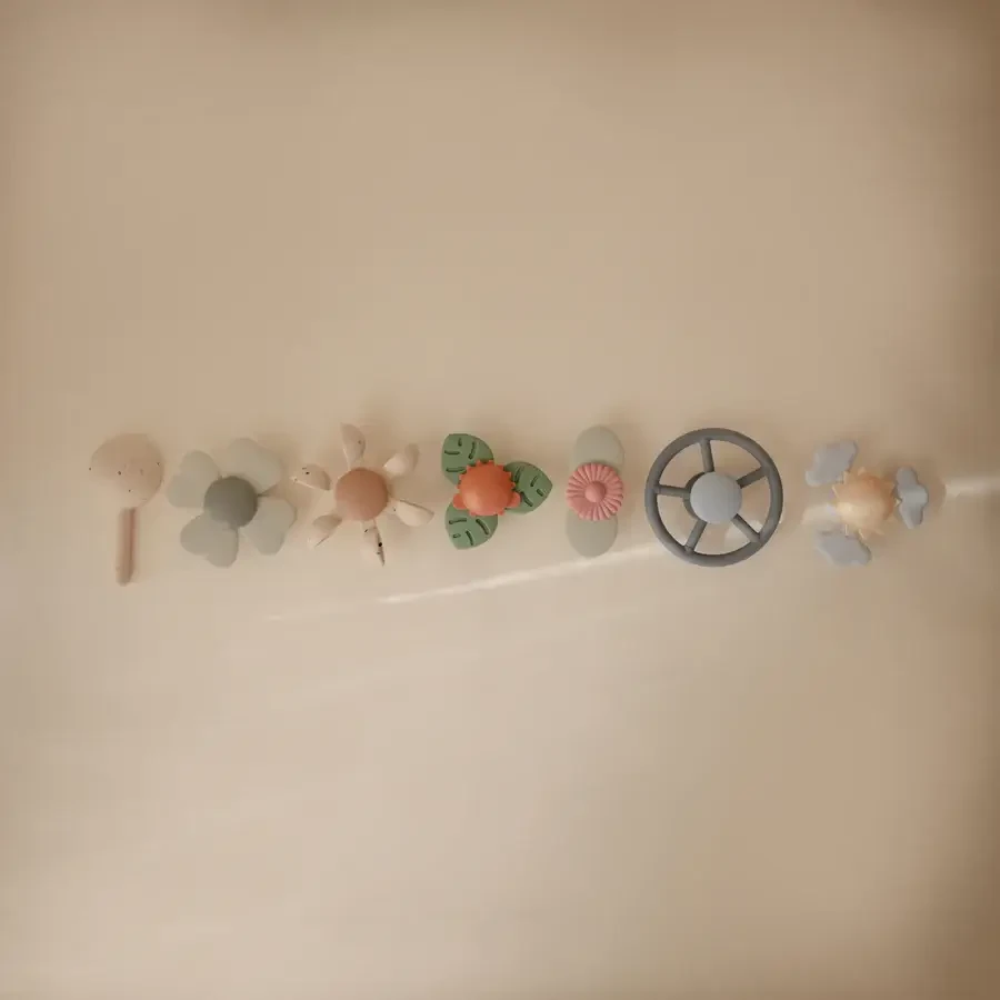 Spinner sensoryczny z przyssawką - Water Wheel / Mushie