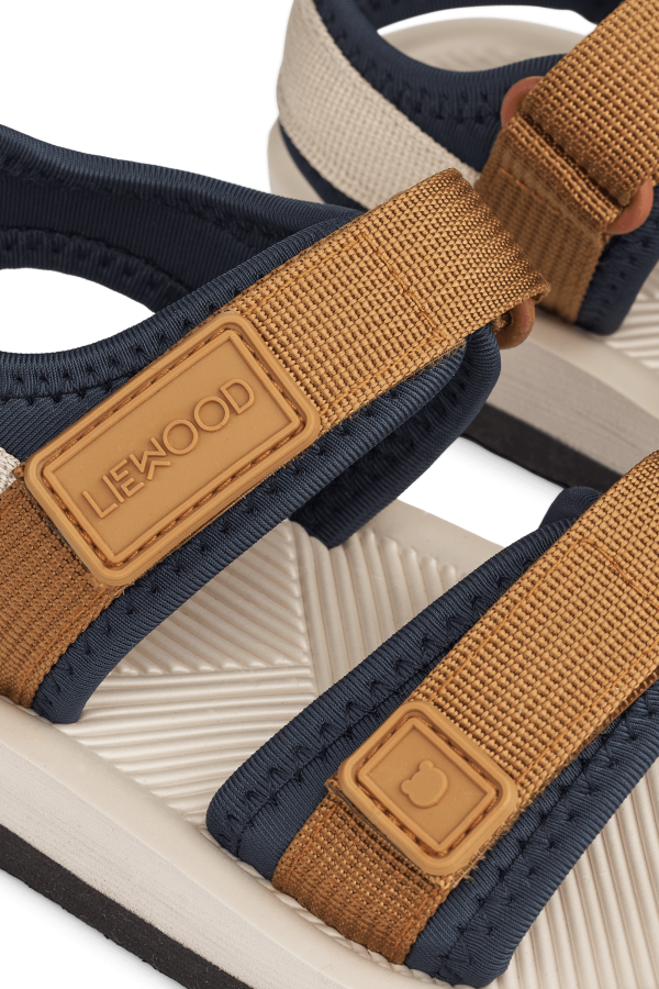 Sandały z paskami Monty - golden caramel mix / Liewood