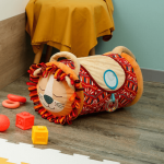 Roller sensoryczny z pokrowcem – lew / LUDI