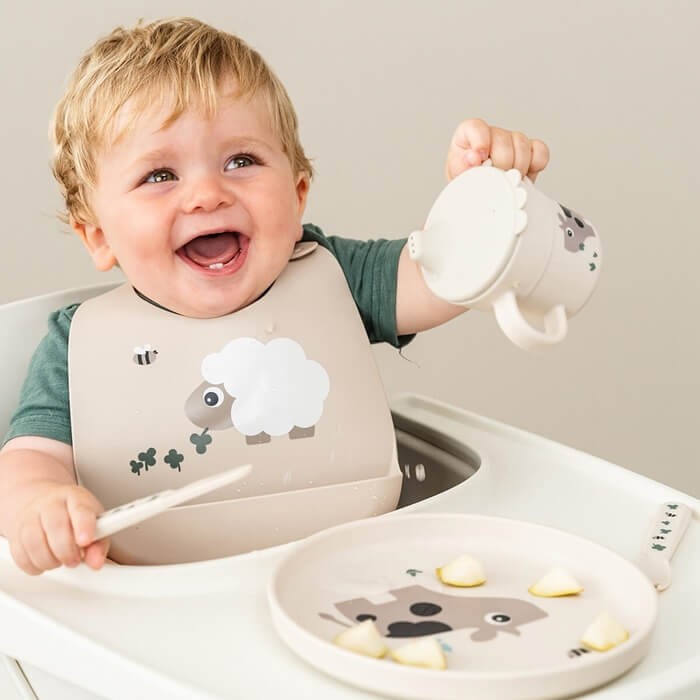 Śliniak silikonowy z kieszonką Owieczka Sheepy Sand / Done by Deer