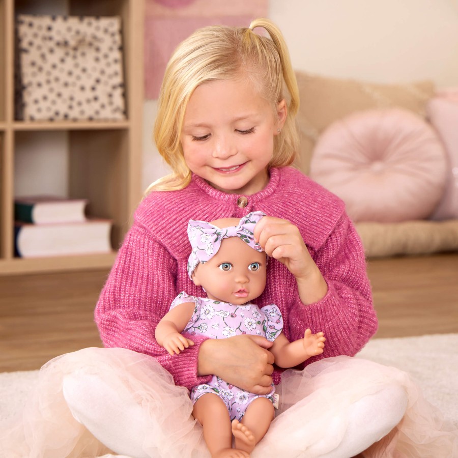 Lalka niemowlę ze smoczkiem, w ubranku w kwiatuszki i opasce, fioletowa / LullaBaby