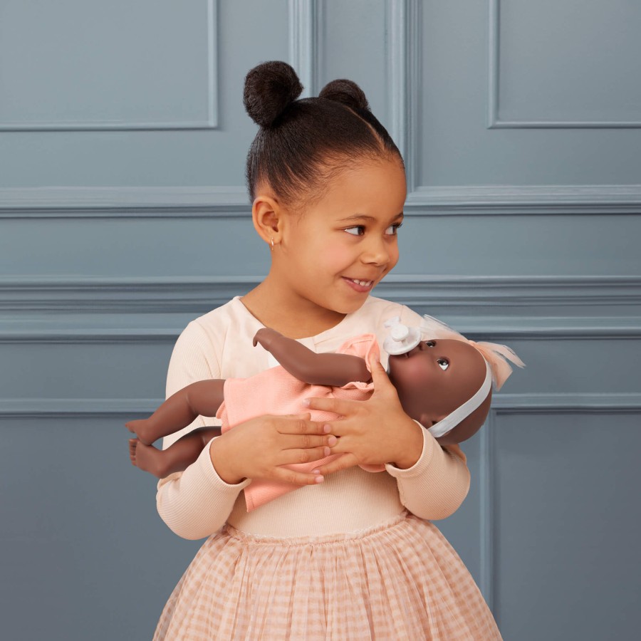 Lalka niemowlę ze smoczkiem, w sukience i opasce, wersja brzoskwiniowa / LullaBaby