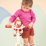 Lalka dzidziuś w foteliku rowerowym z komforterem i kaskiem Lena 18 m+ / Lilliputiens