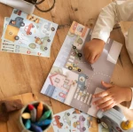 Książeczka z naklejkami Jim na ulicy / Little Dutch