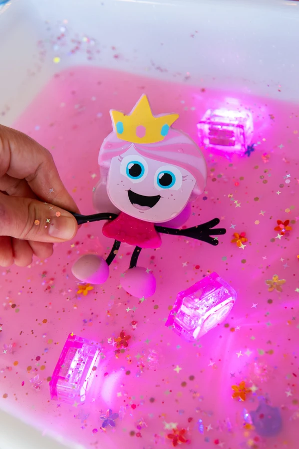 Postać do kąpieli Ida - zestaw z dwiema kostkami sensorycznymi świecącymi w wodzie / Glo Pals