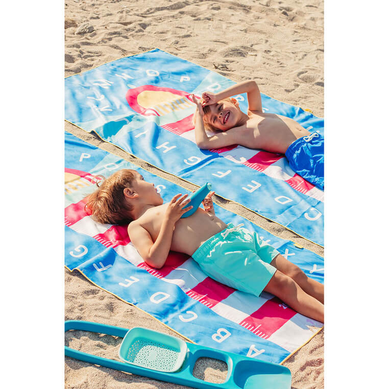 Dwustronny ręcznik plażowy PlayTowels - Lighthouse Blue / QUUT