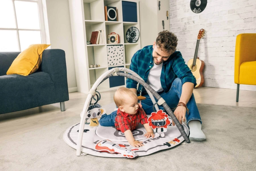 USZKODZONE OPAKOWANIE: Gimnastyka, mata edukacyjna z pałąkami - Tiny Rockers / Tiny Love