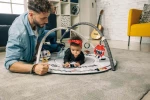 USZKODZONE OPAKOWANIE: Gimnastyka, mata edukacyjna z pałąkami - Tiny Rockers / Tiny Love