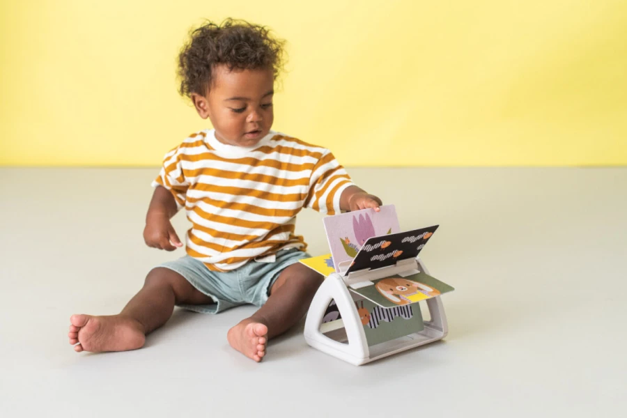 Obracająca się książeczka grzechocząca Tummy Time / Taf Toys