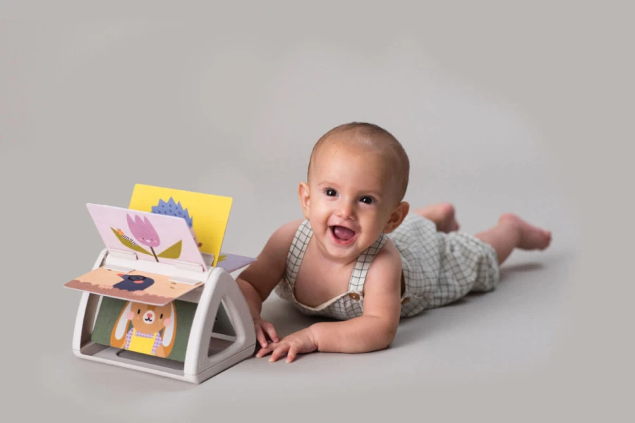 Obracająca się książeczka grzechocząca Tummy Time / Taf Toys