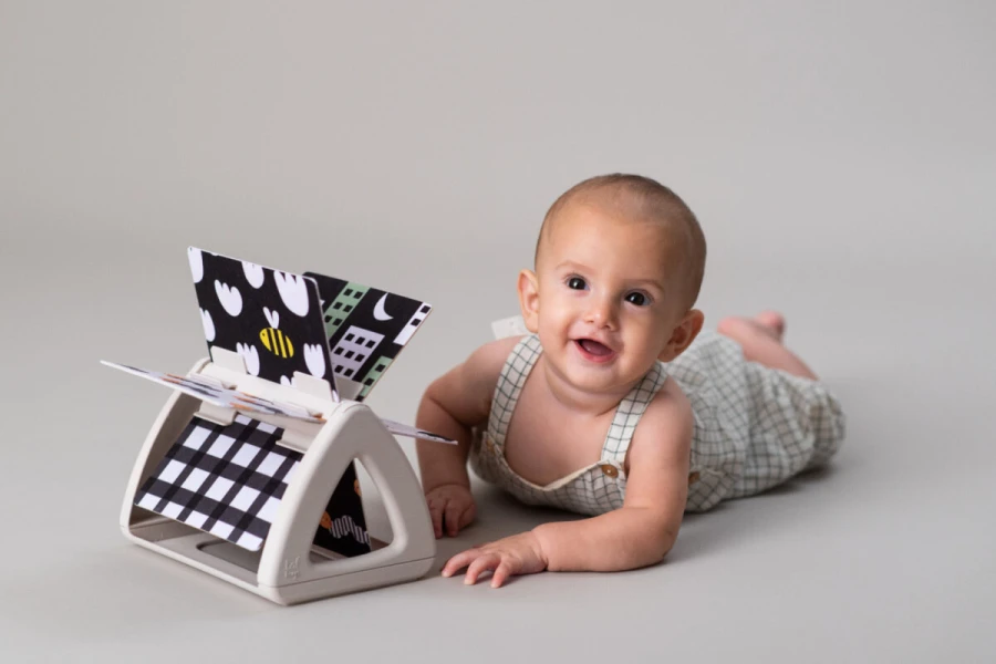 Obracająca się książeczka grzechocząca Tummy Time / Taf Toys