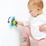 Spinner sensoryczny KOALA z przyssawką i gryzakiem / LUDI