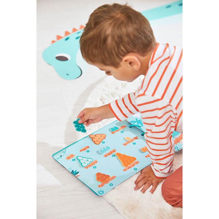 Książeczka z zadaniami Busy Book Dinozaury 3+ / Janod