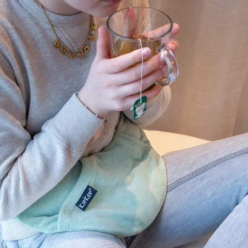 Poduszka grzewcza łagodząca objawy menstruacji Lexie - Pale Green / KipKep
