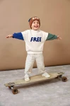 Bluza z bawełny organicznej GOTS Little Gang Free milky / Lassig