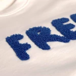 Bluza z bawełny organicznej GOTS Little Gang Free milky / Lassig