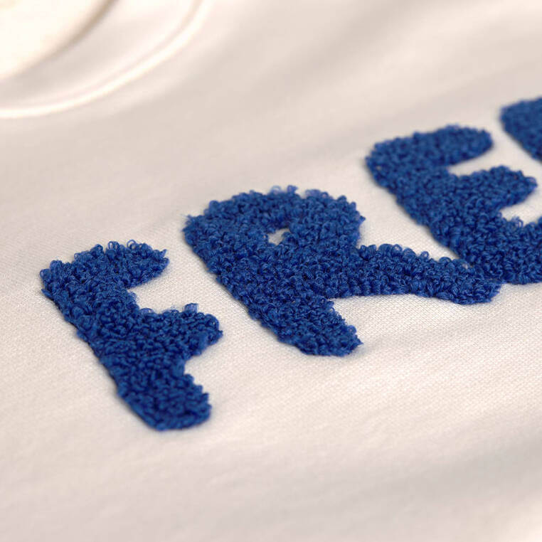 Bluza z bawełny organicznej GOTS Little Gang Free milky / Lassig