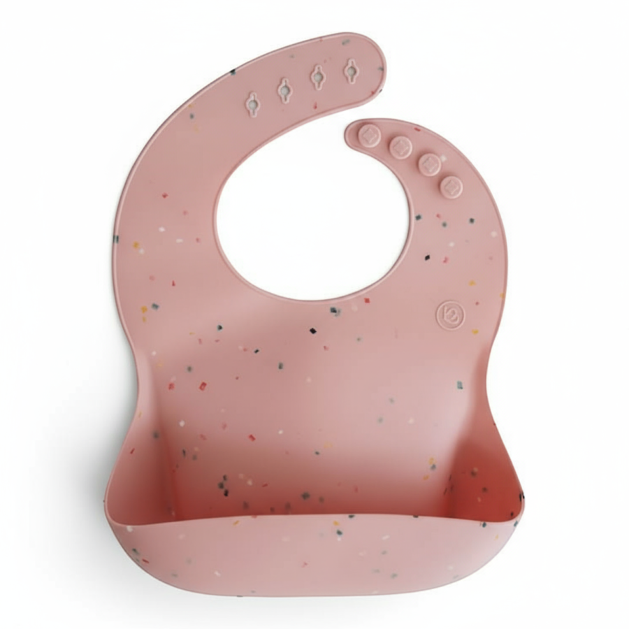 Śliniak silikonowy Powder Pink Confetti / Mushie