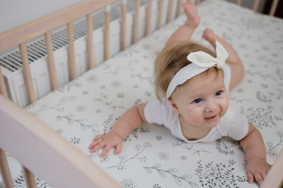 Prześcieradło do łóżeczka We care Bloom / Sleepee