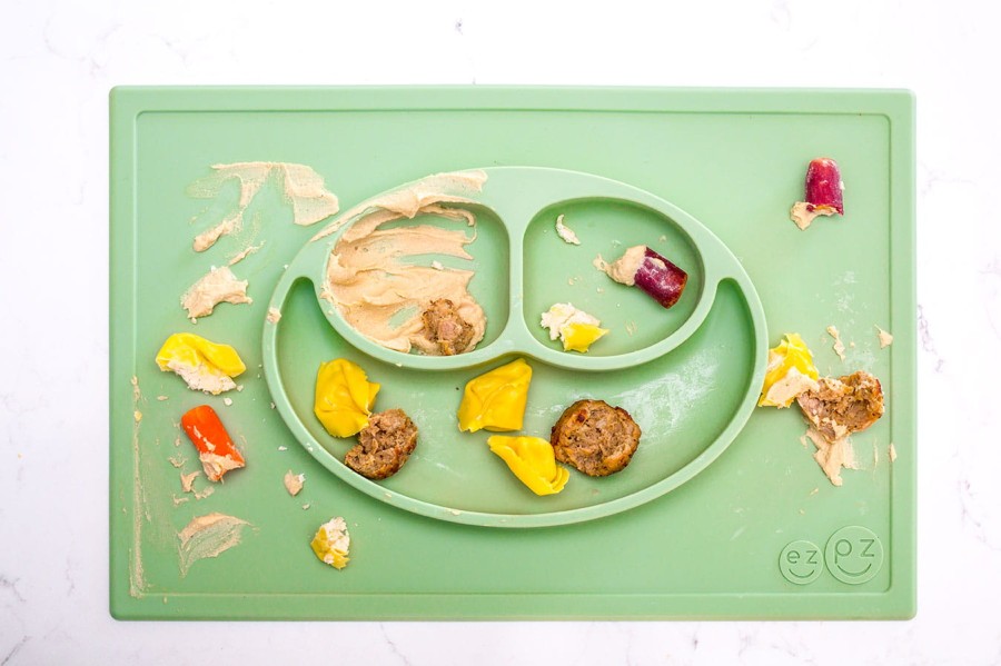 Silikonowy talerzyk z podkładką 2w1 Happy Mat pastelowa zieleń / EZPZ