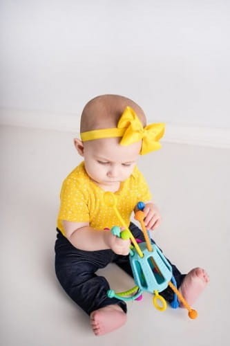 Przeciąganiec Zippee. Zabawka sensoryczna.