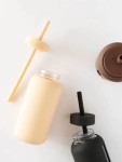Szklana butelka do monitorowania dziennego nawodnienia Day Bottle - CREAM / BINK