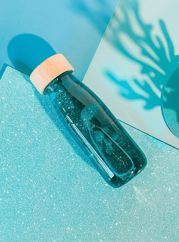 Butelka sensoryczna FLOAT turkusowa / Petit Boum