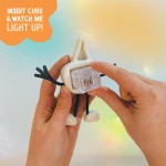 Postać do kąpieli Party Pal - zestaw z dwiema kostkami sensorycznymi świecącymi w wodzie / Glo Pals