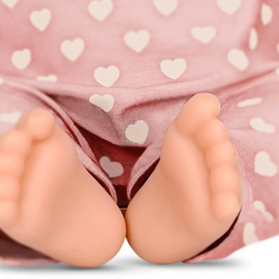 Lalka niemowlę ze smoczkiem, w piżamce w serduszka i czapeczce / LullaBaby