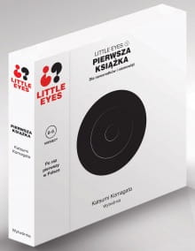 Biała książka z czarną kropką na okładce