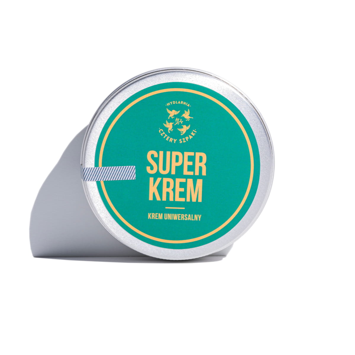 Krem w zielonym opakowaniu z dodatkiem srebrnych elementów